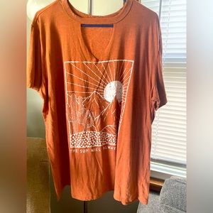 Orange Maurice’s shirt